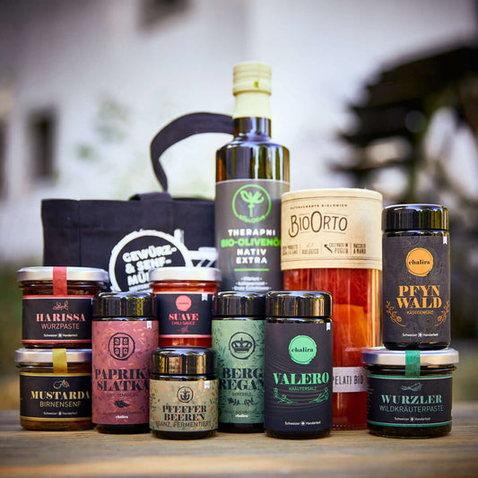 Geschenktasche schwarz mit Delikatessen befüllt