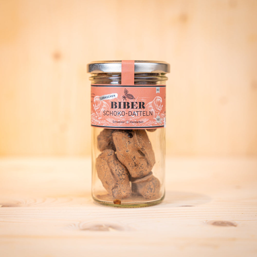 BIBER - BIO Lebkuchen Schoko-Datteln im Glas mit Schoko-überzogenem Datteln sichtbar.