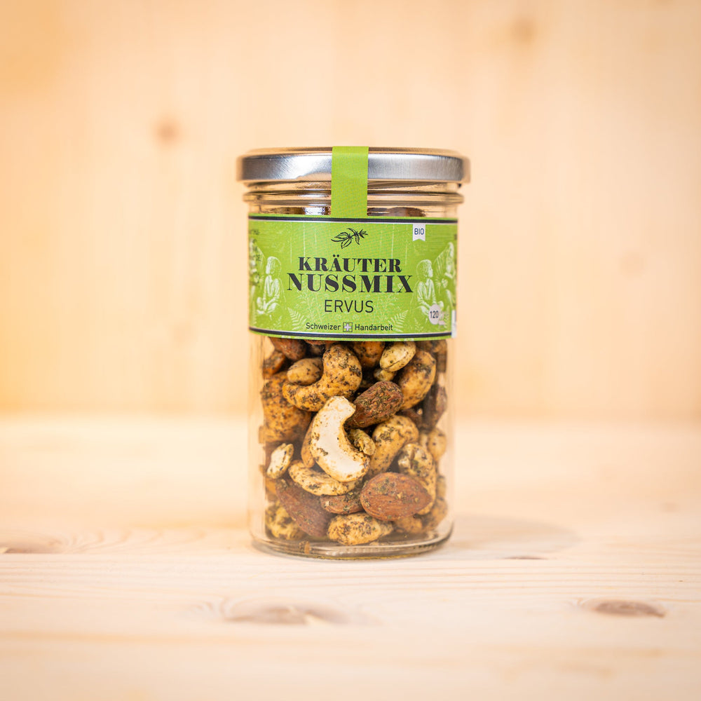 Kräuter-Nussmix ERVUS BIO Kräuternüsse mit Brennnesseln in Glasbehälter, handgemacht in der Schweiz.