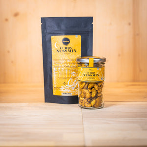 Curry-Nussmix – KIRPAN BIO im Glas und im Nachfüllbeutel,  köstliche Curry-Nuss-Snacks mit frischem Curry-Geschmack.